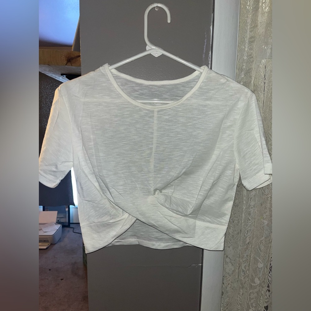 White Sheer Women's Twist workout top, size small.